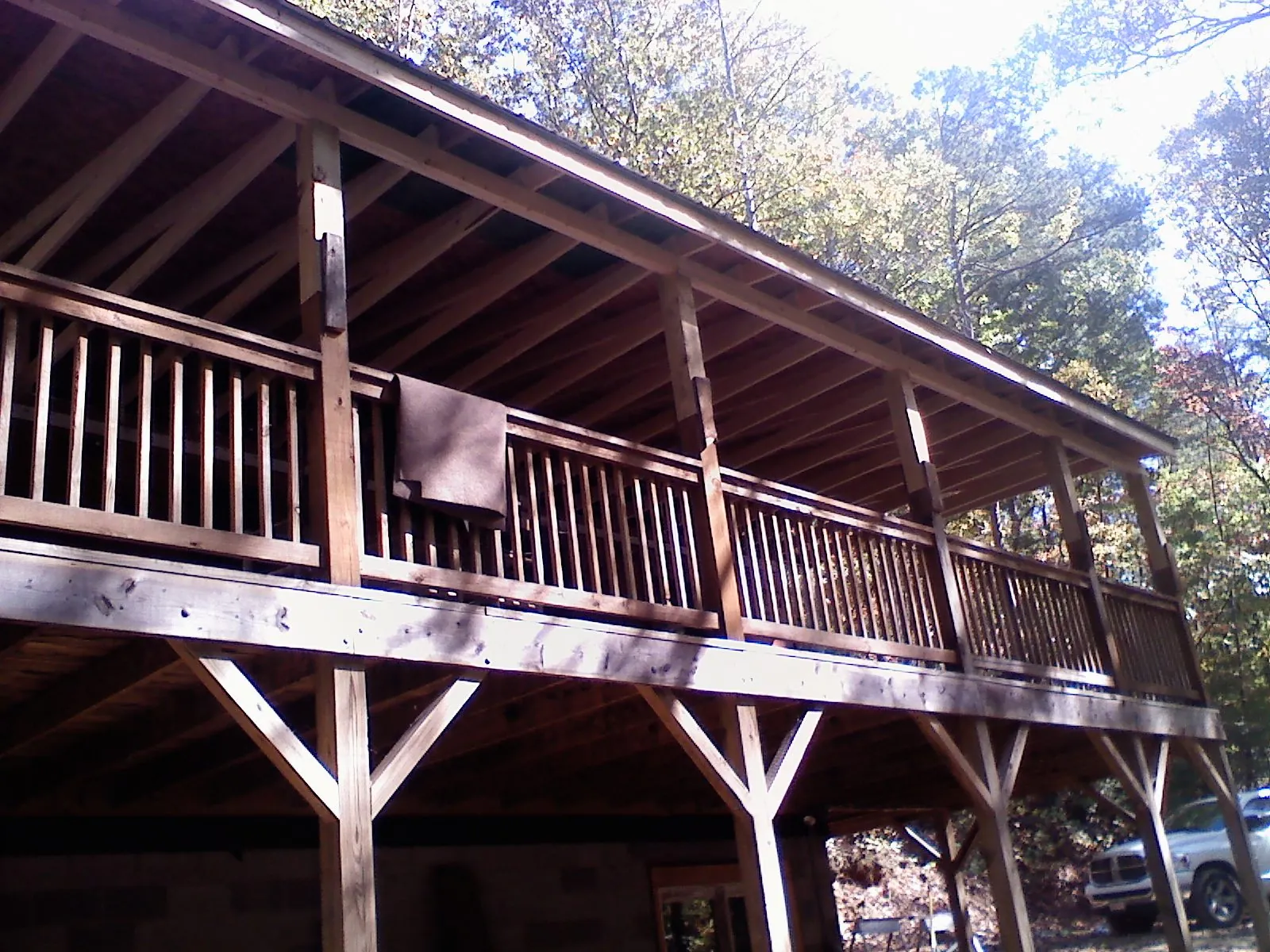 Timber framing under a new elevated porch and deck — Roof Leak Repair in East Troy by Roofing Brothers
